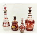 A large 19th Century ruby decorated glass Decanter and stopper, 33cms (13