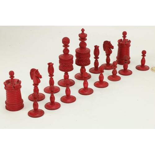 55 - An attractive late 19th Century carved ivory Chess Set, (32 pieces complete) with half stained red, ... 