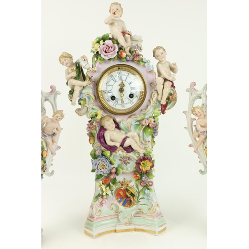 73 - A good quality late 19th Century Continental porcelain Dresden style Clock Set, the large centerpiec... 