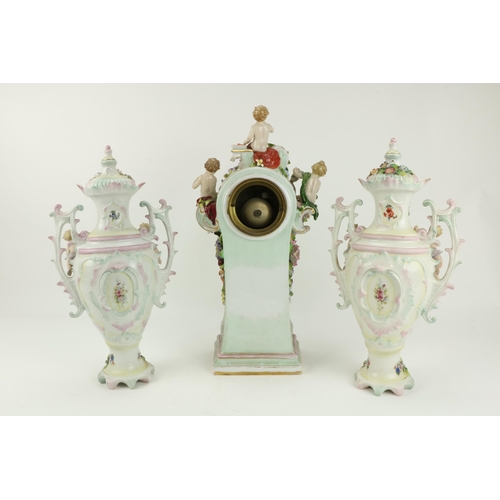 73 - A good quality late 19th Century Continental porcelain Dresden style Clock Set, the large centerpiec... 