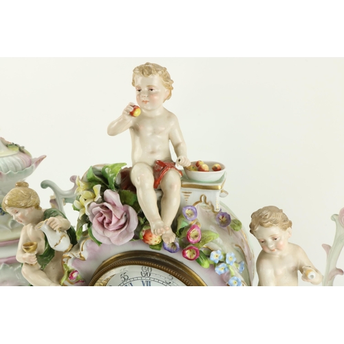 73 - A good quality late 19th Century Continental porcelain Dresden style Clock Set, the large centerpiec... 