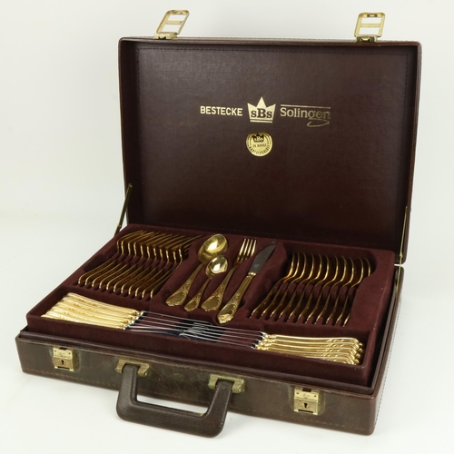 83 - A cased set of Bestecke (S.B.S.) 24 carat Hartvergoldet Solingen Cutlery, for a 12 setting, includin... 