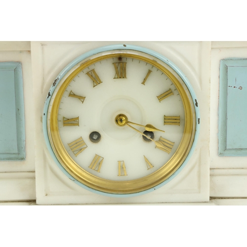 95 - A heavy Victorian white marble Mantle Clock, of breakfront outline and with large gilt metal figure ... 