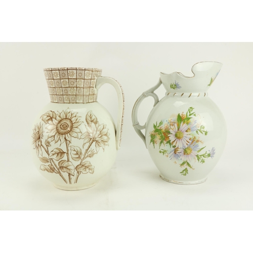 96 - A large Belleek pottery Jug, (dam.); and one other Jug  (2)