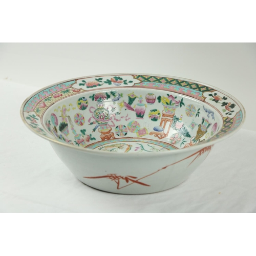 240 - An attractive 19th Century Cantonese Bowl, the decorative rim designed in panels, the interior displ... 