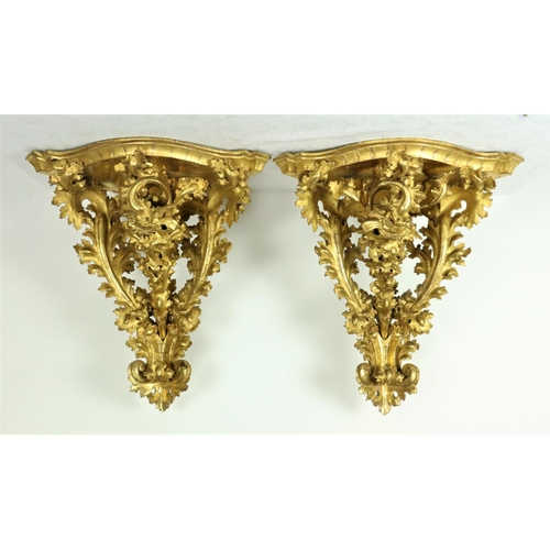 370 - A pair of important 19th Century English giltwood Corner Wall Brackets, with shaped shelf supported ... 