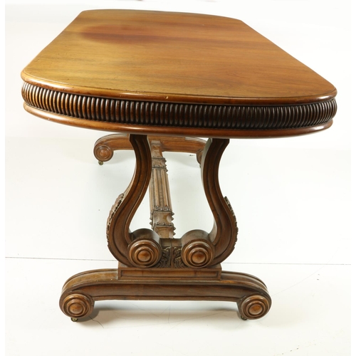 519 - A fine quality English Regency rosewood Library Table, the finely figured top above a wide moulded a... 