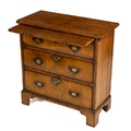 A fine quality walnut Chest, 18th Century and later, the segmented top with herring bone inlay and m... 