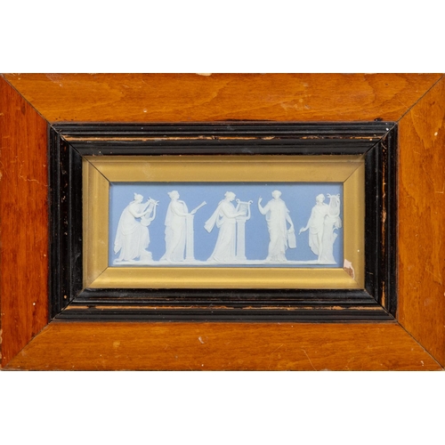 238 - A large blue and white Jasperware Wedgwood Panel, with dancing classical women in relief, 15cms x 47... 