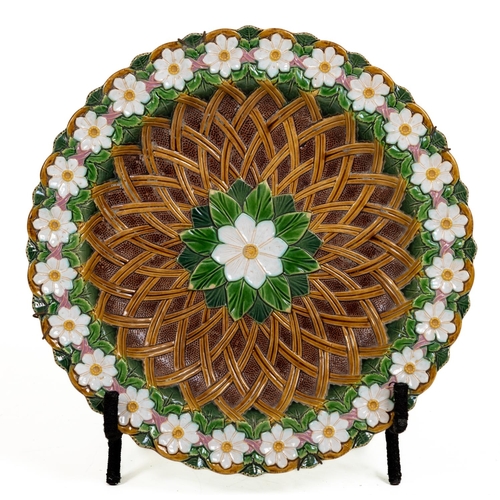 240 - A large Victorian Majolica polychrome Dish, probably Mintons, with basket weave in relief and a bord... 