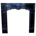 A rare early Irish Kilkenny black marble Chimneypiece, George I, the shaped and moulded frieze with ... 