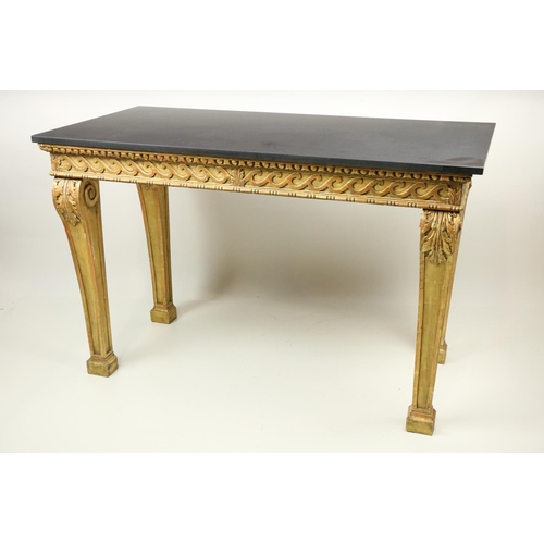 99 - A fine pair of William Kent style carved giltwood Console Tables, each with a Vitruvian scroll carve... 