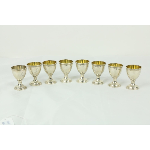 679 - A set of 8 silver Egg Cups. (8)