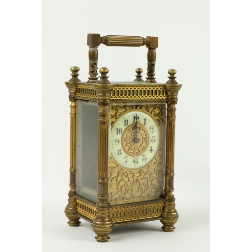 749 - A 19th Century ormolu cased Carriage Clock, with filigree design, enamel face, reeded pillars and hi... 