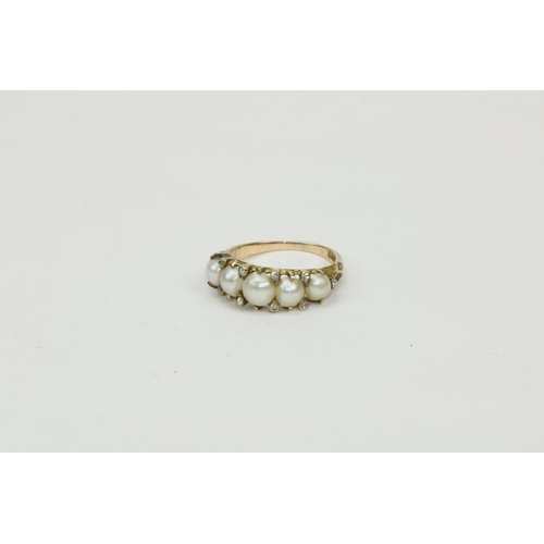 782 - An attractive gold Ring, by West & Son, Dublin, with band of five pearls (some natural) and nine... 