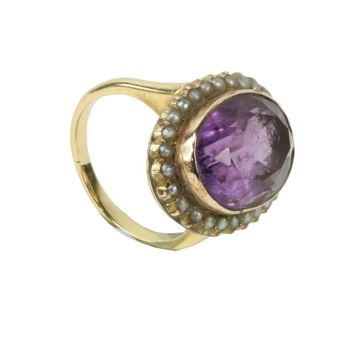 788 - An good large rare purple tourmaline cut oval Stone, set with gold mount surround and 26 pearls, on ... 