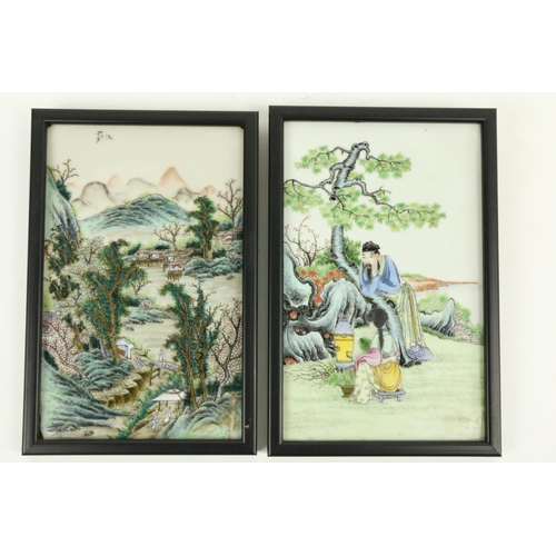 849 - A good pair of Chinese Famille Verte Panels, each depicting figures in landscape, 8