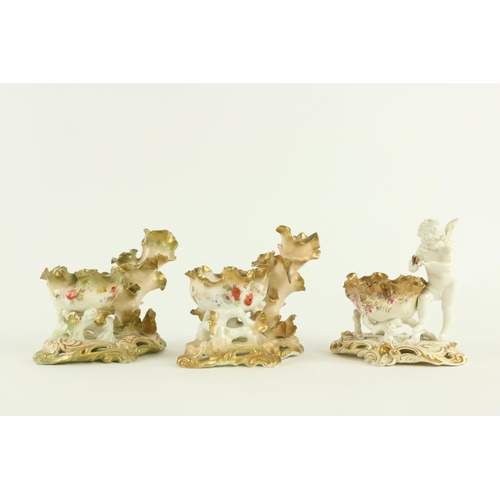 900 - A near pair of colourful 19th Century Moore Brothers porcelain Sweet Meat Stands, in the rococo styl... 