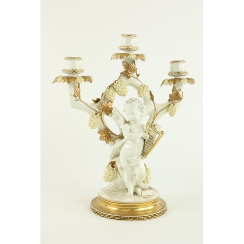 919 - A 19th Century Moore Brothers two branch three light Candelabrum, in white and parcel gilt, encruste... 