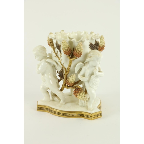 930 - A Moore Brothers cream ground porcelain Centerpiece, the bowl encrusted with branches of pine c... 