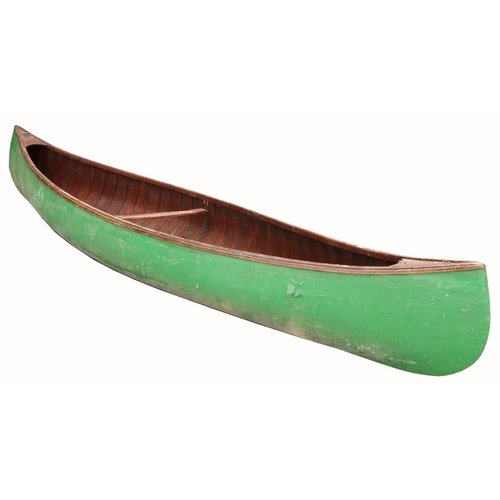 1594 - A late 19th Century American double ended peapod Canoe or Skiff, with latted interior and centre cro... 