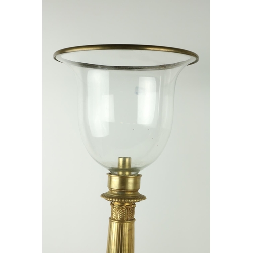 130 - An attractive pair of gilt and cast brass tall Candle Lanterns, each with a glass shade on a reeded ... 