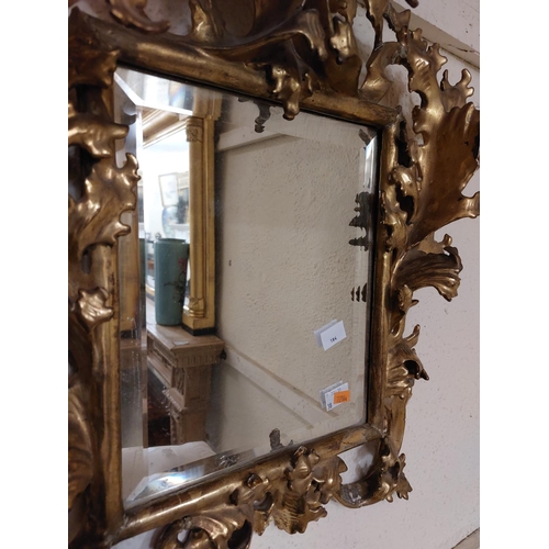 184 - An attractive 19th Century giltwood Italian 'Florentine' type Frame, with mirror inset, with open sc... 