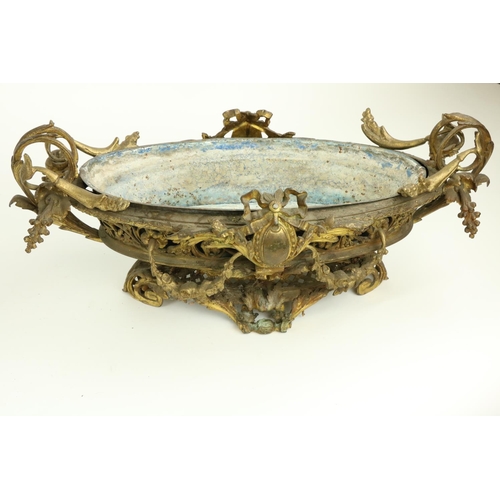 250 - A good pair of French bronze and gilt bronze oval Jardinières, each in the rococo style with scrolli... 