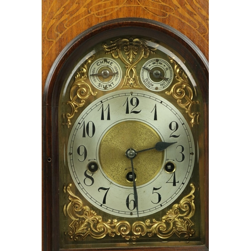 254 - An Edwardian marquetry inlaid chiming dome top Bracket Clock, the brass and silverised dial with Ara... 