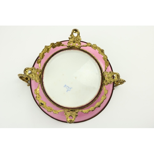 261 - A very attractive  pink ground floral decorated Serves style porcelain Dish, on ornate rococo style ... 