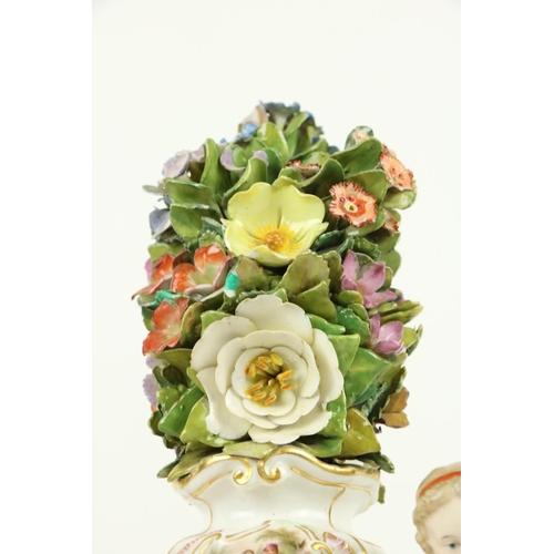 268 - An attractive Meissen porcelain flower encrusted Clock, c. 1900, with floral finial above four ... 