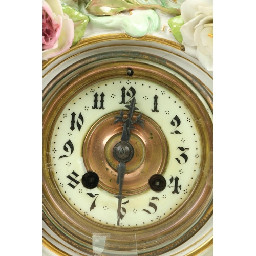 268 - An attractive Meissen porcelain flower encrusted Clock, c. 1900, with floral finial above four ... 