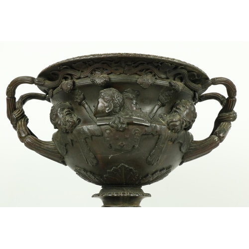 276 - A fine large bronze Model of the Warwick Vase, with classical heads in relief and lion pelts and app... 