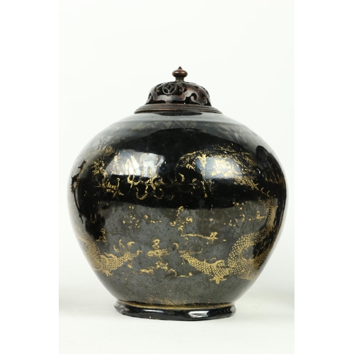 279 - A black ground Chinese Dragon Vase, with wooden cover and six character mark, 10