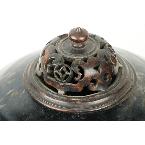 279 - A black ground Chinese Dragon Vase, with wooden cover and six character mark, 10