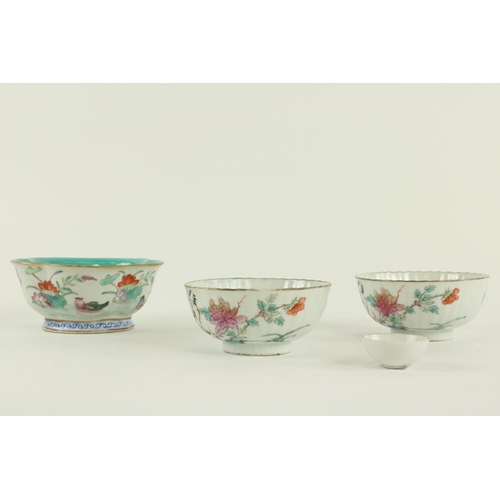 285 - A pair of Chinese porcelain Famille Verte reeded Bowls, with flowers and birds, each with a square r... 