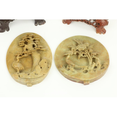 299 - Two Chinese carved soapstone Panels, one round carved with bird and flower, on separate carved and f... 