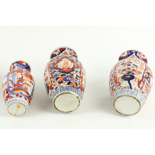 307 - A pair of Japanese Imari Vases, each decorated in typical palette, 10 1/2