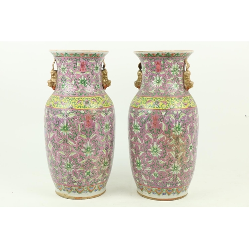 313 - A good pair of Cantonese pink ground Chinese porcelain Vases, decorated all over with flowers, each ... 