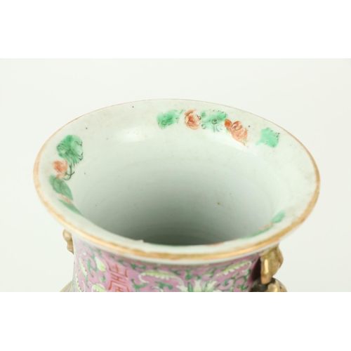 313 - A good pair of Cantonese pink ground Chinese porcelain Vases, decorated all over with flowers, each ... 