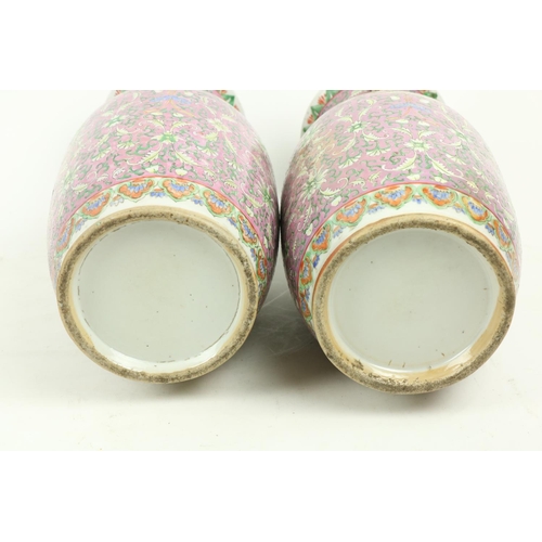 313 - A good pair of Cantonese pink ground Chinese porcelain Vases, decorated all over with flowers, each ... 