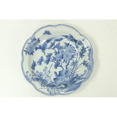 315 - An attractive large 19th Century Japanese blue and white Dish, decorated with birds and flowers, ser... 