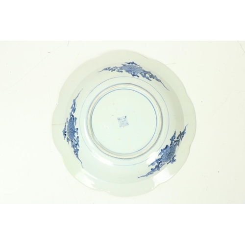 315 - An attractive large 19th Century Japanese blue and white Dish, decorated with birds and flowers, ser... 