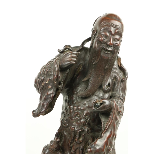 324 - A fine Chinese carved rootwood Figure, of an Immortal 22