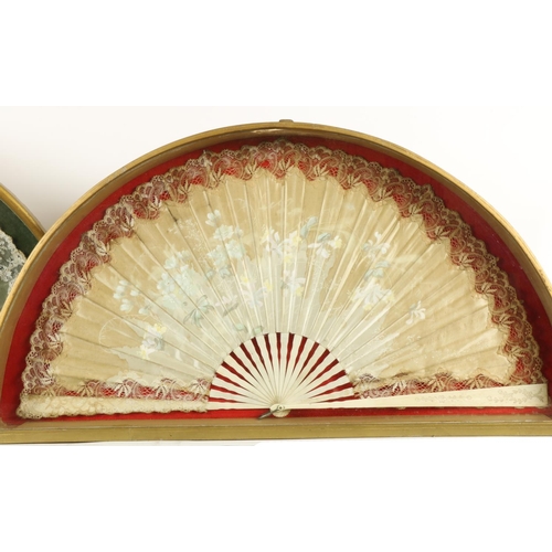 353 - An attractive floral painted silk Fan, in arched case, 29