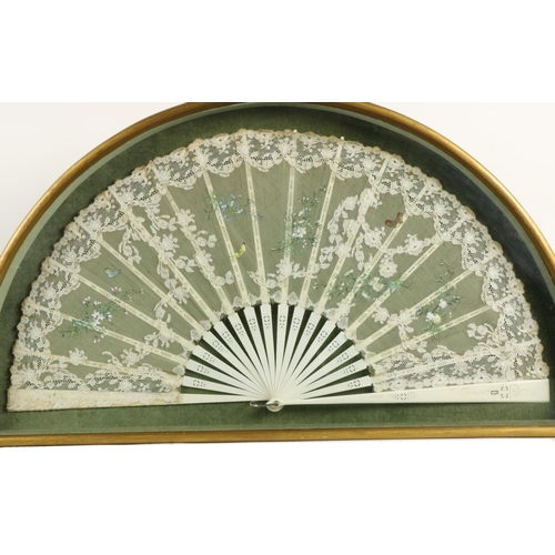 353 - An attractive floral painted silk Fan, in arched case, 29