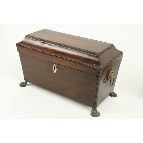 357 - A late Regency period mahogany Tea Caddy, with three compartment interior, of casket form with lion ... 