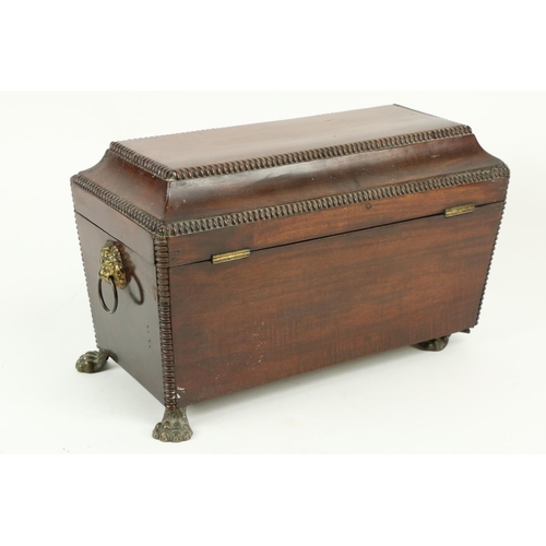 357 - A late Regency period mahogany Tea Caddy, with three compartment interior, of casket form with lion ... 