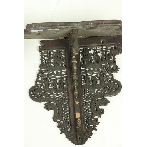 358 - A rare pair of carved and pierced Chinese cherrywood Wall Brackets, (one as is) each carved with fig... 