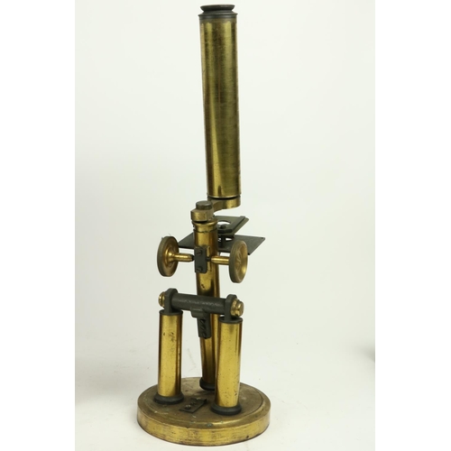 365 - A late 19th Century brass monocular Microscope, in fitted mahogany case, 13